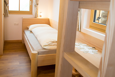 Stockbettzimmer im Wohnhaus Edelweiß